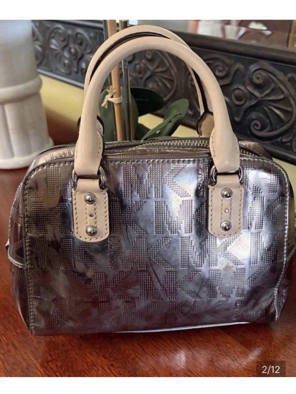 Michael Kors Metallic Silver Mini
Satchel w/Monogram MK Charm - Picture 2 of 10